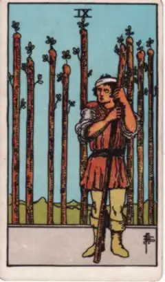 Tarotkarte Neun der Stäbe